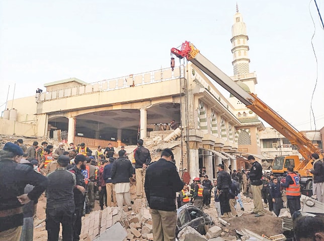  RESCUE work underway at Peshawar Police Lines mosque after the Jan 30 bomb attack.&mdash;White Star file 