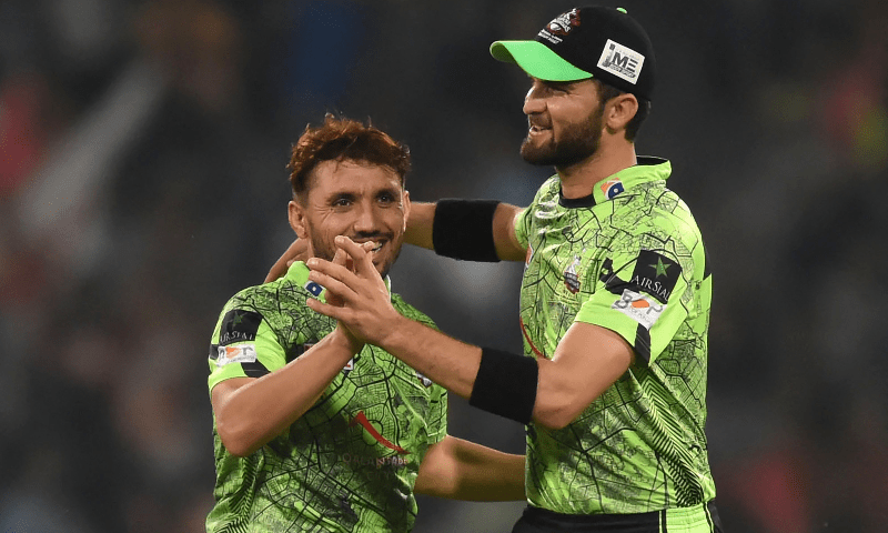 Lahore Qalandars Zaman Khan (L) celebrates with teammate Shaheen Shah Afridi (R) the dismissal of Multan Sultans’ Rilee Rossouw (not pictured) during the Pakistan Super League (PSL) Twenty20 cricket qualifier match between Multan Sultans and Lahore Qalandars at the Gaddafi Cricket Stadium in Lahore on March 15, 2023. — AFP