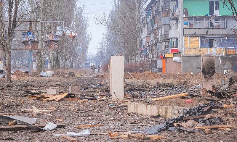 UKRAINIAN soldiers patrol an empty street in the frontline city of Bakhmut.—Reuters UKRAINIAN soldiers patrol an empty street in the frontline city of Bakhmut.—Reuters