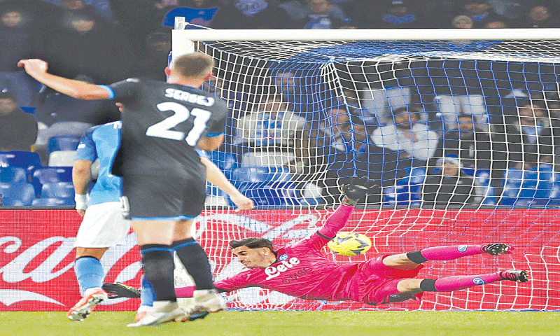 NAPLES: Napoli goalkeeper Alex Meret fails to stop a shot from Lazio&rsquo;s Matias Vecino during their Serie A match at the Stadio Diego Armando Maradona.&mdash;Reuters