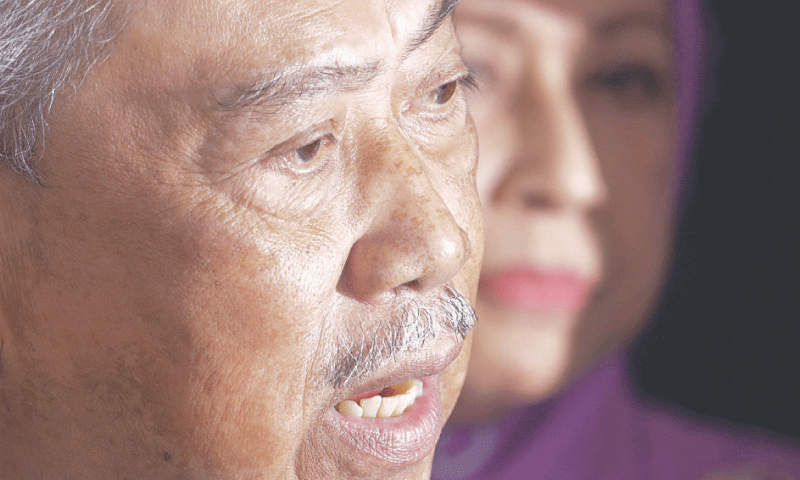 Former Malaysian prime minister Muhyiddin Yassin speaks during a news conference at a court in Kuala Lumpur on Friday.&mdash;Reuters