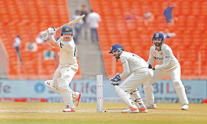 AUSTRALIAN batter Travis Head plays a shot during the fourth Test against India at the Narendra Modi Stadium on Monday.—Reuters AUSTRALIAN batter Travis Head plays a shot during the fourth Test against India at the Narendra Modi Stadium on Monday.—Reuters