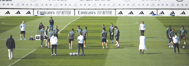 MADRID: Real Madrid players in action during a training session at Valdebebas on Tuesday. Real hold a 5-2 advantage over Liverpool heading into the second leg of their Champions League last-16 tie at home on Wednesday. In the day’s other tie, Napoli welcome Eintracht Frankfurt with a 2-0 lead from the first leg.—Reuters