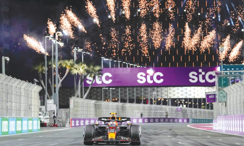 RED Bull Racing’s Sergio Perez of Mexico celebrates after winning the Saudi Arabia Formula One Grand Prix at the Jeddah Corniche Circuit.—AFP RED Bull Racing’s Sergio Perez of Mexico celebrates after winning the Saudi Arabia Formula One Grand Prix at the Jeddah Corniche Circuit.—AFP
