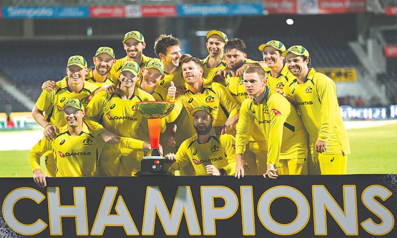 AUSTRALIAN cricketers celebrate with the series trophy.—AFP