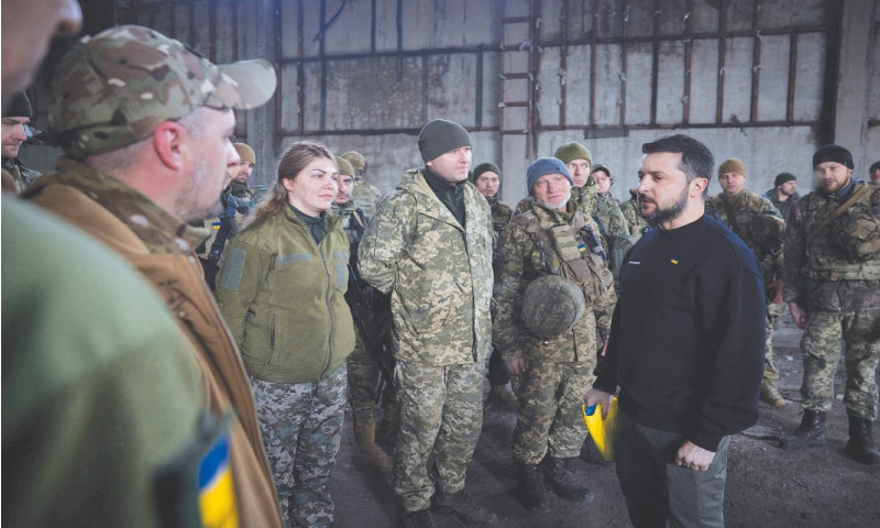 Zelensky visits frontline; Russian strikes hit school, flats ...