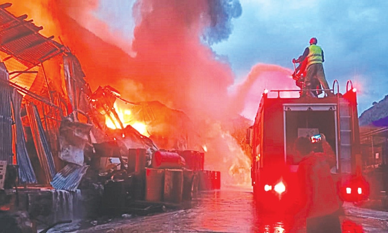 THE early morning fire, apparently caused by a short circuit, gutted the camp housing Chinese workers at the Dasu hydropower project site in the Barseen area of Lower Kohistan, on Tuesday.—Photo by the writer