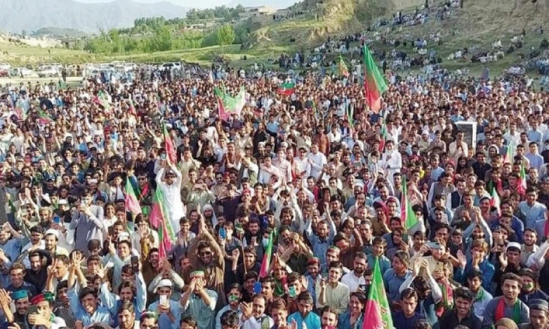 PTI workers stage a protest in Salarzai tehsil of Bajaur on Wednesday. &mdash; Dawn