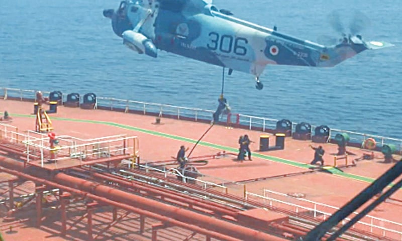 A GRAB taken from a video released by Iran’s military on Friday shows personnel of the Iranian navy boarding the oil tanker seized by Tehran.—AFP A GRAB taken from a video released by Iran’s military on Friday shows personnel of the Iranian navy boarding the oil tanker seized by Tehran.—AFP