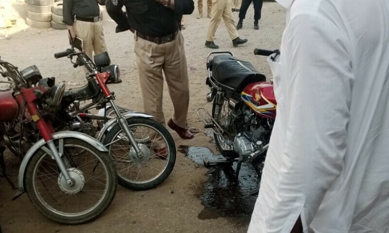 The photos shows scenes outside a motorcyle workshop in Peshawar, where a blast was reported on Thursday. — Photo by author