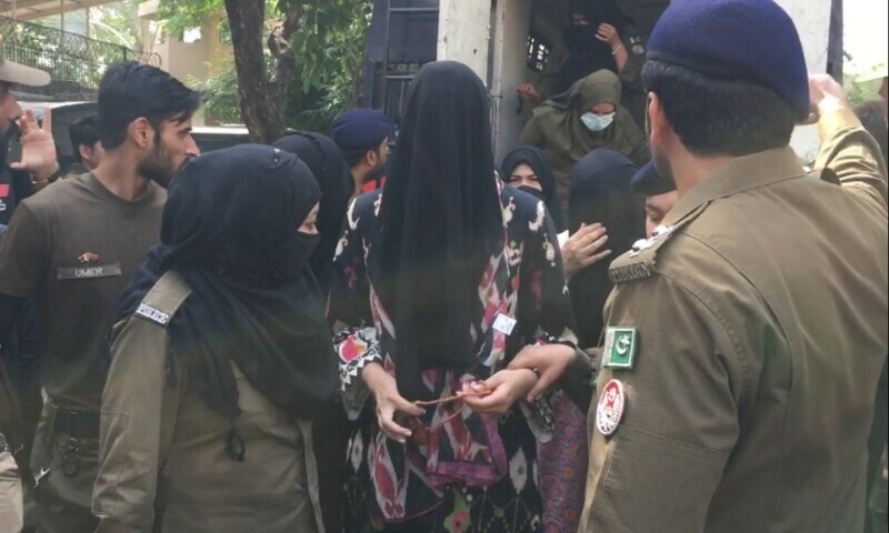 Khadija Shah was produced in court on Wednesday with a black cloth covering her face. — Photo courtesy: Rana Bilal