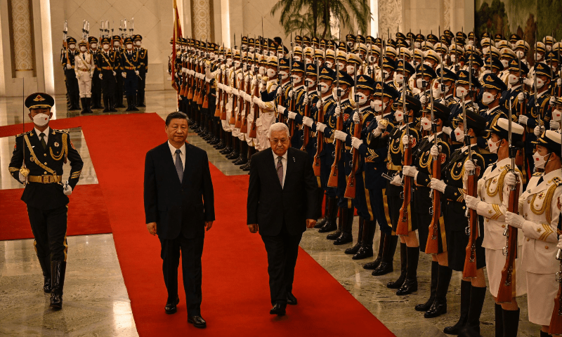 China&rsquo;s President Xi Jinping (C) and Palestinian President Mahmud Abbas attend a welcoming ceremony at the Great Hall of the People in Beijing on June 14. &mdash; AFP