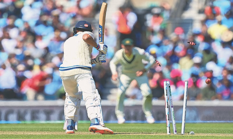 BAILS fly as Indian opener Shubman Gill is cleaned up by Australian pacer Scott Boland during the World Test Championship final at
The Oval on Thursday.—AFP BAILS fly as Indian opener Shubman Gill is cleaned up by Australian pacer Scott Boland during the World Test Championship final at
The Oval on Thursday.—AFP