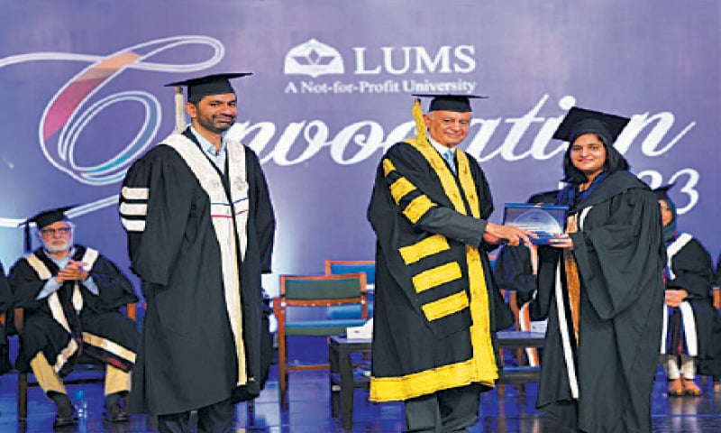 LUMS Pro Chancellor Abdul Razak Dawood presents an award to a graduate. &mdash; Dawn