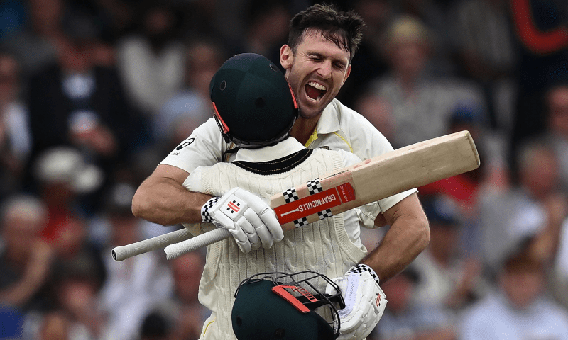Australia&rsquo;s Mitchell Marsh celebrates with Australia&rsquo;s Travis Head (L) after reaching his hundred on day one of the third Ashes cricket Test match between England and Australia at Headingley cricket ground in Leeds, northern England on July 6. &mdash; AFP