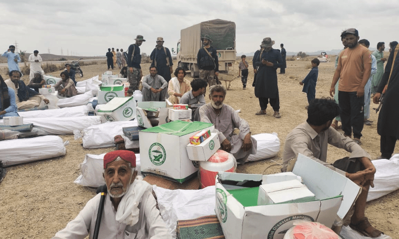  Relief items are being distributed to people in Balochistan’s Washuk district on Sunday — Photo provided by Abdullah Zehri 