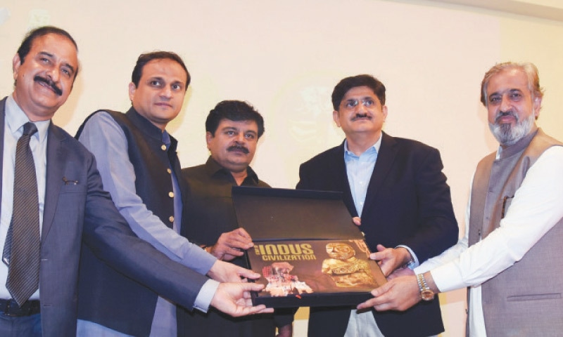 CM Murad Ali Shah, along with Karachi Mayor Murtaza Wahab, Culture Minister Sardar Shah, Special Assistant Tariq Hasan and Secretary Aleem Lashari, launches the book on Wednesday.&mdash;Dawn