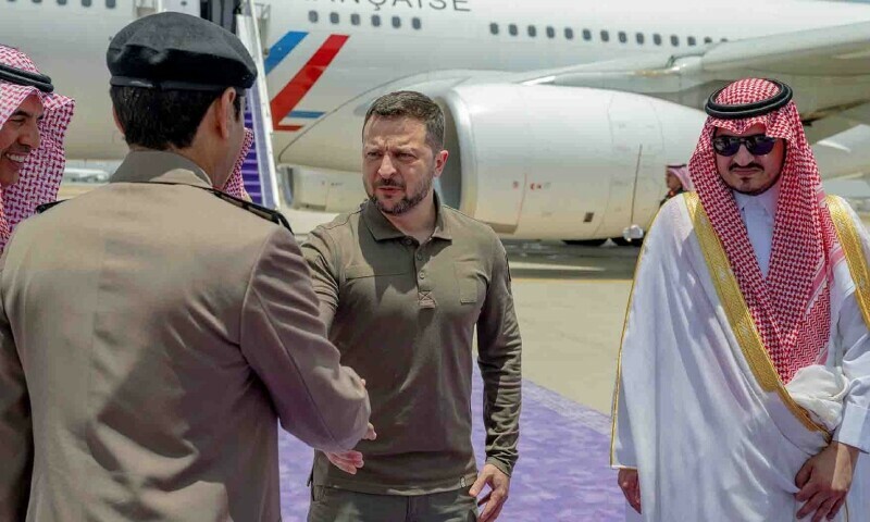 This handout picture provided by the official Saudi Press Agency SPA, shows Ukraine’s President Volodymyr Zelensky greeting Saudi officials next to the Deputy Emir of Mecca, Prince Badr bin Sultan bin Abdulaziz (R), in Jeddah where the former arrived on May 19, 2023 to participate in the Arab League Summit. — AFP