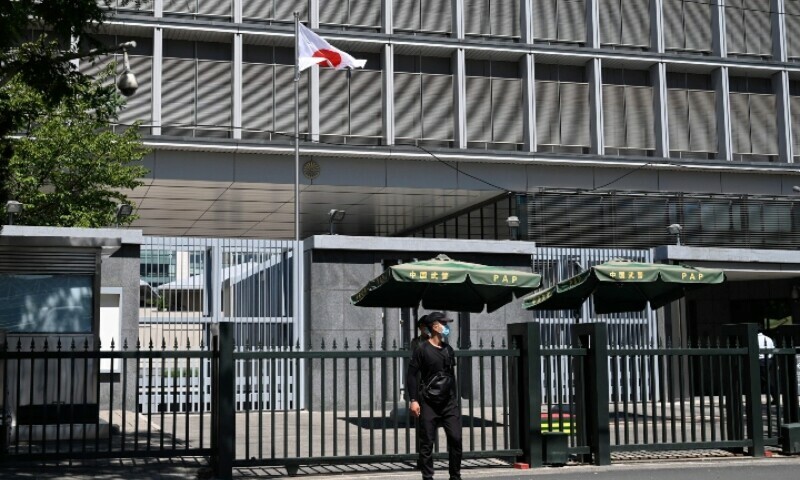 Police and security personnel stand outside the entrance of the Japanese embassy in Beijing on August 29, 2023. Japan said on August 29 that harassment being faced by Japanese in China after the release of water from the Fukushima nuclear plant was “extremely regrettable”, confirming that a brick was thrown at the country’s embassy in Beijing. — AFP Police and security personnel stand outside the entrance of the Japanese embassy in Beijing on August 29, 2023. Japan said on August 29 that harassment being faced by Japanese in China after the release of water from the Fukushima nuclear plant was “extremely regrettable”, confirming that a brick was thrown at the country’s embassy in Beijing. — AFP