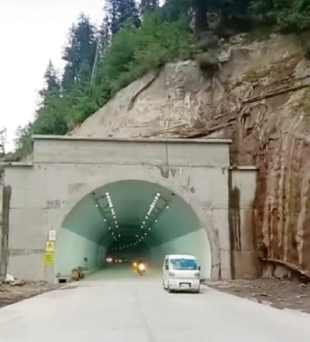 Motorists use a tunnel on a new section of MNJ Road in Kaghan on Wednesday. &mdash; Dawn