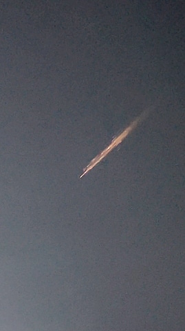 MELBOURNE: A streak of light, which the Australian Space Agency identified as the probable remnants of a Russian rocket, is seen in the night sky in this still image obtained from social media video.—Reuters