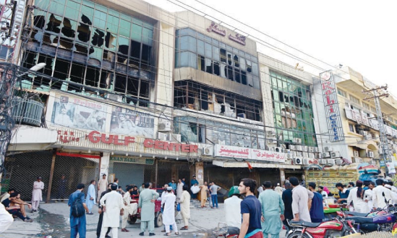 More than 40 shops, offices and warehouses were damaged in the fire that broke out in Gulf Centre in Rawalpindi. — File Photo More than 40 shops, offices and warehouses were damaged in the fire that broke out in Gulf Centre in Rawalpindi. — File Photo