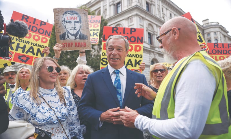 Nigel Farage, a former leader of Britain&rsquo;s Brexit Party, attends a demonstration outside the Houses of Parliament against the expansion of London&rsquo;s Ultra Low Emissions Zone.&mdash;Reuters