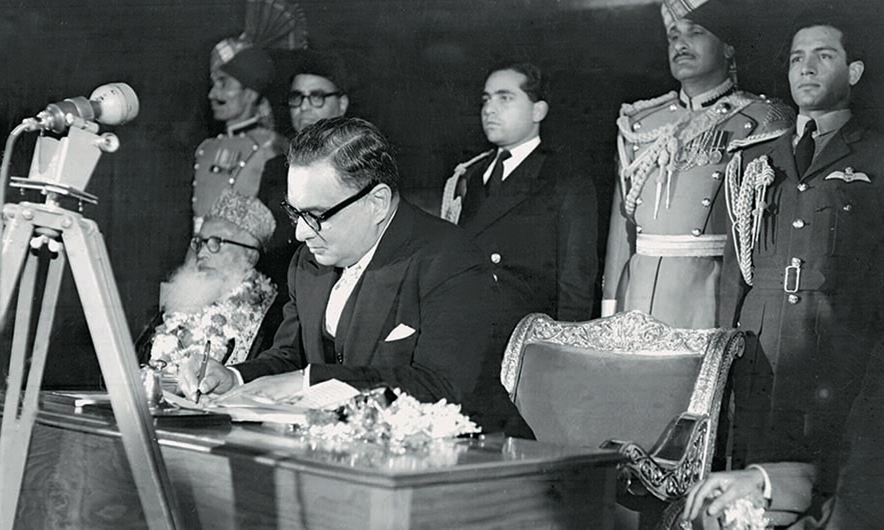 Iskander Mirza signing his assent on the 1956 Constitution Bill at a ceremony held on March 2, 1956, in Karachi | Ministry of Information and Broadcasting