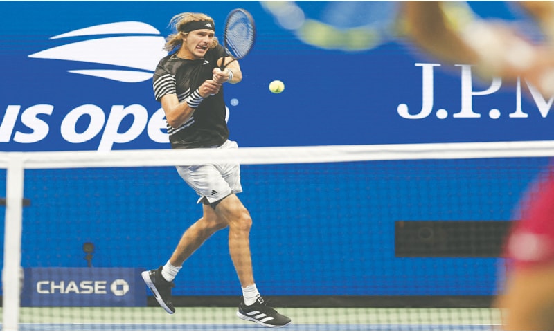 GERMANY&rsquo;S Alexander Zverev hits a backhand return against Carlos Alcaraz of Spain during their US Open quarter-final at the USTA Billie Jean King National Tennis Center.&mdash;Reuters