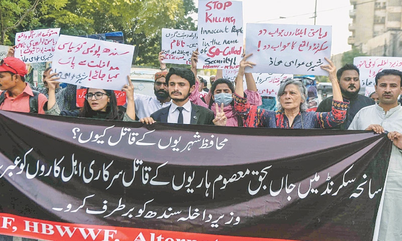 Members of civil society stage a protest outside the Karachi Press Club on Saturday against killings of ‘innocent people’ by law enforcers in Sakrand. —Fahim Siddiqi / White Star