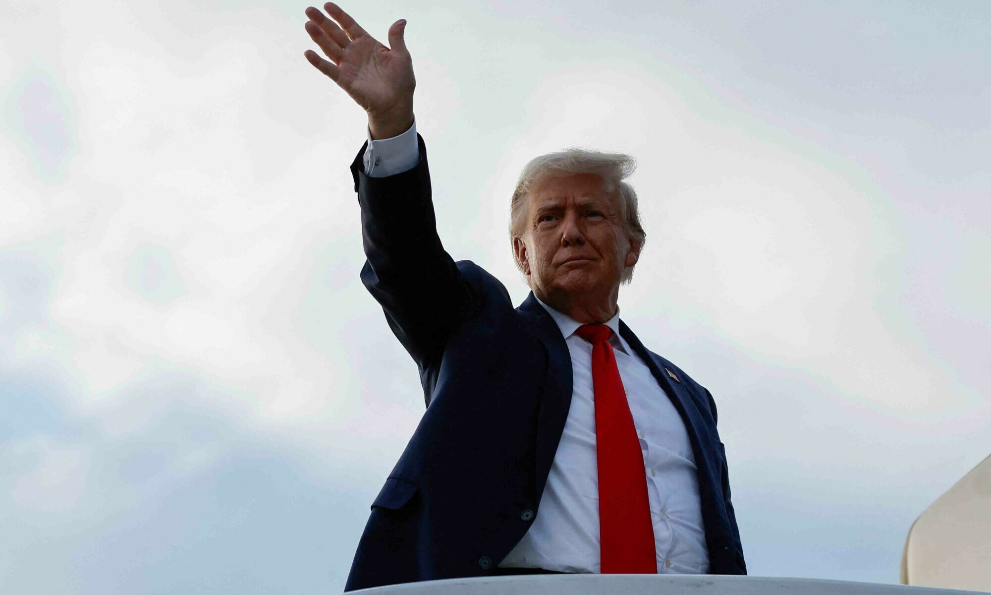 Former US president and Republican presidential candidate Donald waves as he boards his plane to depart from Eastern Iowa Airport after campaigning in Cedar Rapids, Iowa on October 7. — Reuters Former US president and Republican presidential candidate Donald waves as he boards his plane to depart from Eastern Iowa Airport after campaigning in Cedar Rapids, Iowa on October 7. — Reuters