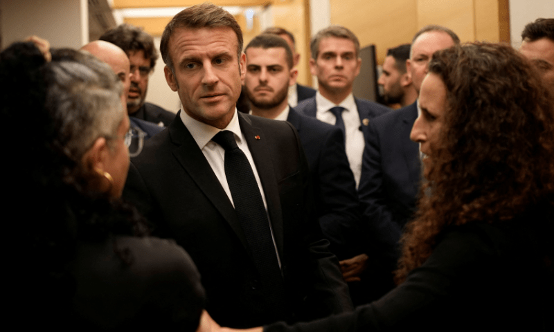 Macron meets Israeli-French nationals and hostages&rsquo; families at the Ben Gurion airport. &mdash; Reuters
