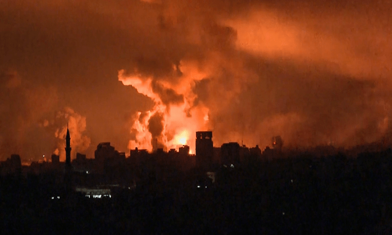  This image grab from an AFP TV footage shows balls of fire and smoke rising above Gaza City during an Israeli strike on October 27, 2023, as battles between Israel and the Palestinian Hamas movement continue. &mdash; AFP 
