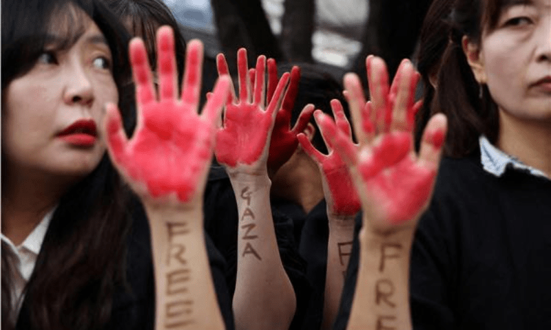 Pro-palestine protestors gather in front of the Foreign Ministry in Seoul. &mdash; Reuters