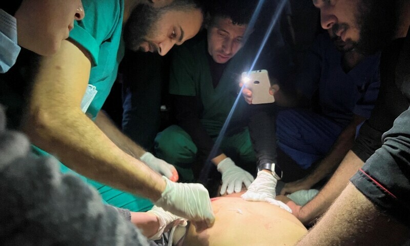 PHOTOS: Medics use phone&rsquo;s flashlight to tend to wounded at Gaza&rsquo;s Indonesian hospital