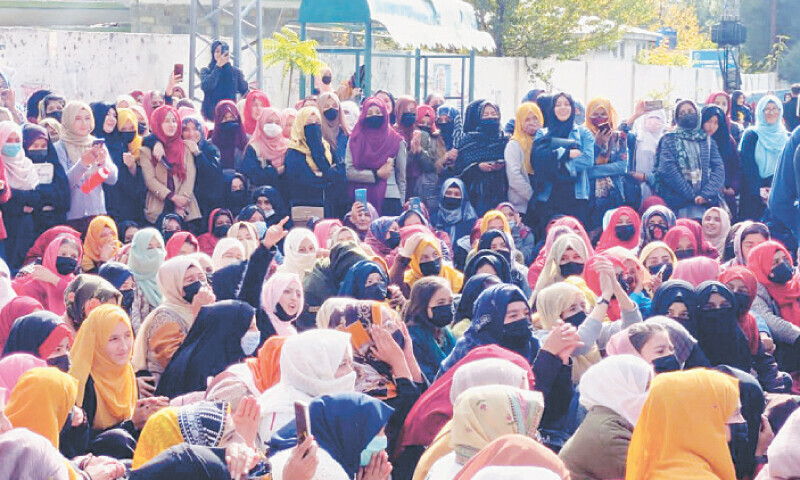 The students stage a sit-in at Glob Chowk outside KIU main campus in Gilgit on Thursday. &mdash; Dawn