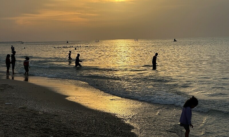 Palestinians spend time on a beach during a temporary truce between Hamas and Israel, in Deir al-Balah in the central Gaza Strip, November 25. &mdash; Reuters