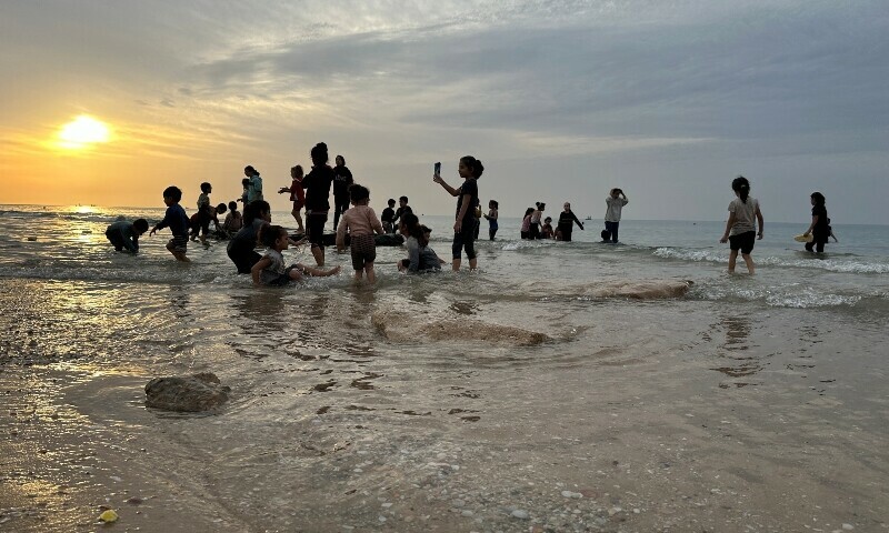 Palestinians spend time on a beach during a temporary truce between Hamas and Israel, in Deir al-Balah in the central Gaza Strip, November 25. &mdash; Reuters