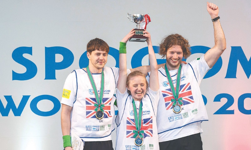 MEMBERS of the British team pose with the trophy after winning the &ldquo;SpoGOMI World Cup&rdquo; final, on Wednesday. Teams pick up as much rubbish as possible within the stipulated time.&mdash;AFP