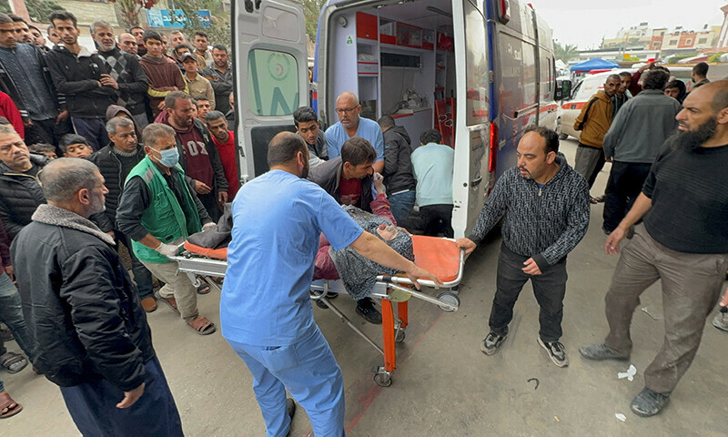 Palestinians wounded in Israeli strikes are rushed into Nasser hospital in Khan Younis in the southern Gaza Strip December 7, 2023.&mdash;Reuters