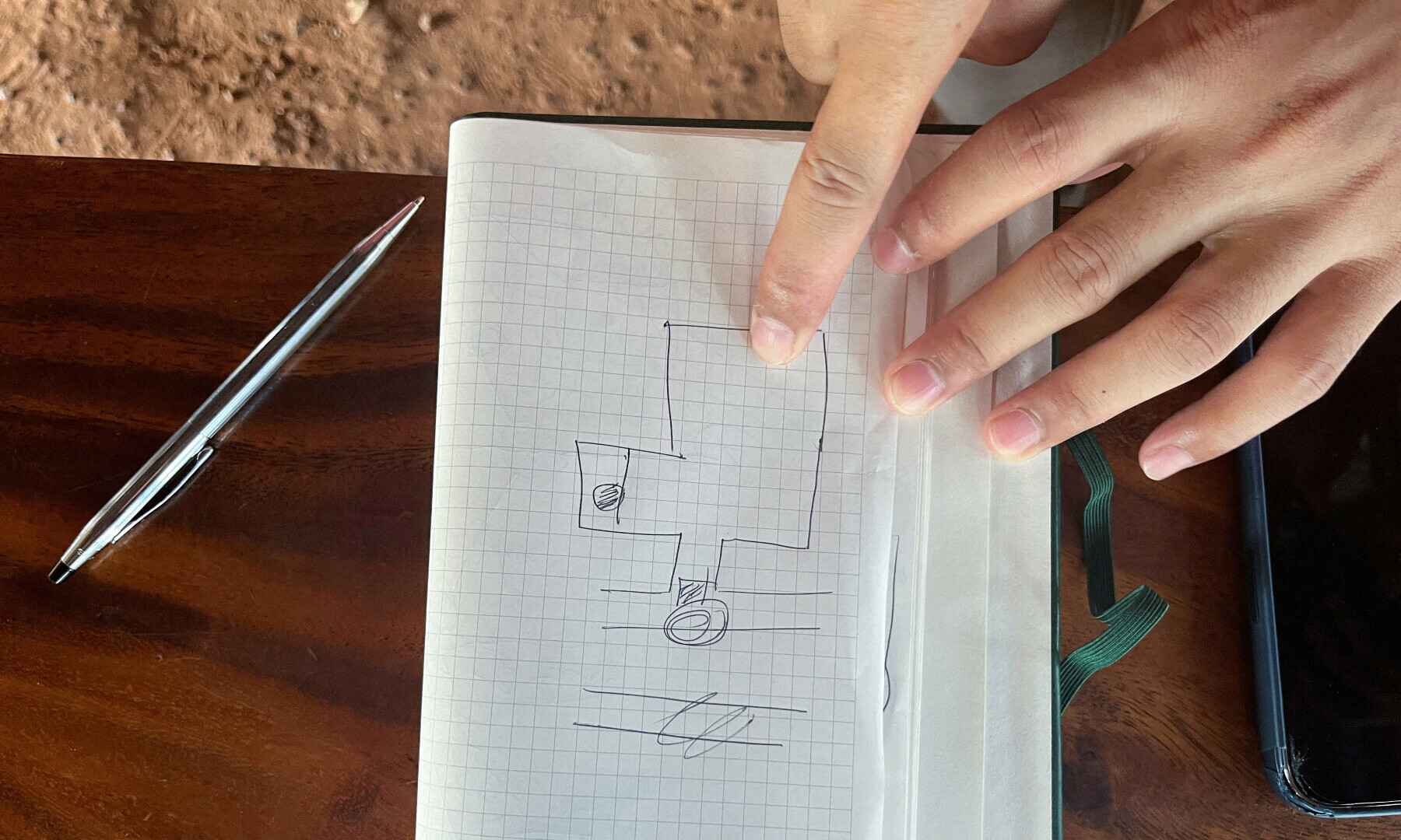  Anucha Angkaew, a Thai farm worker held by Hamas for 50 days, shows a drawing design of one of the rooms where he was held captive in Gaza, at his family home in Udon Thani province, Thailand on Dec 6, 2023. &mdash; Reuters 