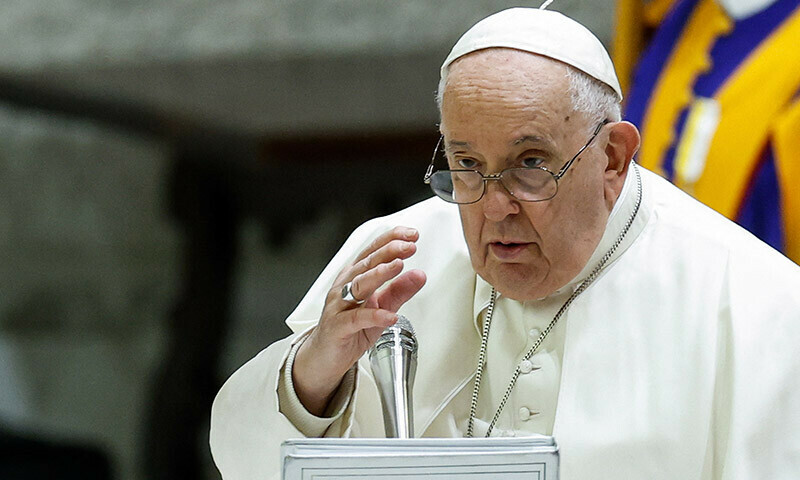 Pope Francis gives a blessing at the end of the weekly general audience, in Paul VI hall at the Vatican, December 13, 2023. &mdash; Reuters