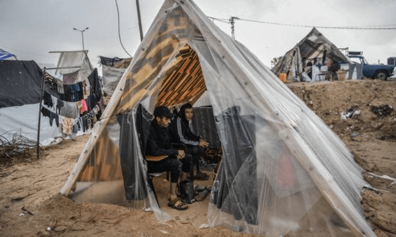 Aid officials say the arrival of winter rain worsened conditions for hundreds of thousands sleeping rough in makeshift tents. &mdash; Anadolu Agency