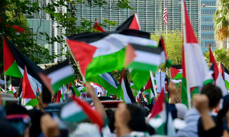 Pro-Palestinian demonstrators take part on a rally in front of the US embassy in Jakarta on December 17, 2023.&mdash;AFP