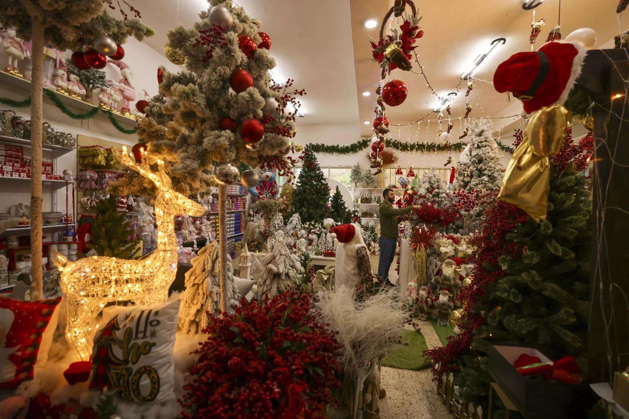 Tourist shops normally do most of their business at Christmas time in Bethlehem, West Bank. &mdash; AFP