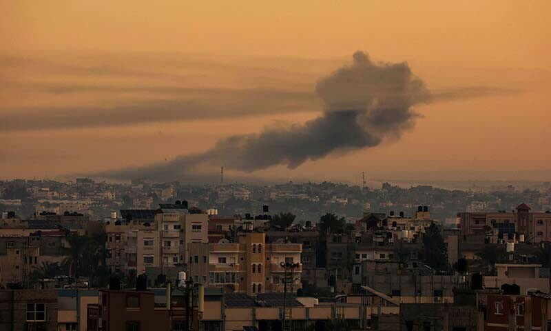Smoke rises over Khan Younis in the southern Gaza Strip during Israeli bombardment as seen from Rafah on December 20, 2023. &mdash; AFP