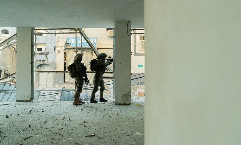 Israeli soldiers operate in the Gaza Strip on December 21, 2023. &mdash; AFP