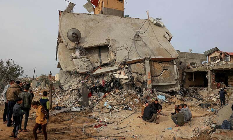 Palestinians check the rubble following Israeli bombardment in Khan Younis in the southern Gaza Strip on December 21, 2023&mdash; AFP