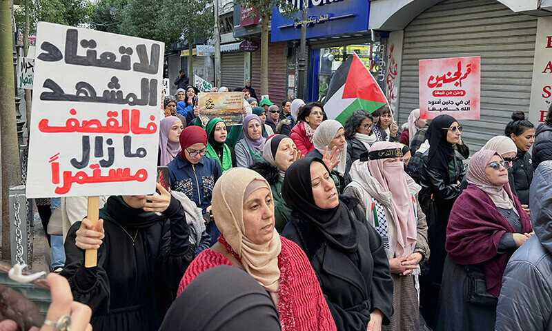 People march as they take part in a protest in support of Palestinians in Gaza on December 22, 2023. &mdash; Reuters