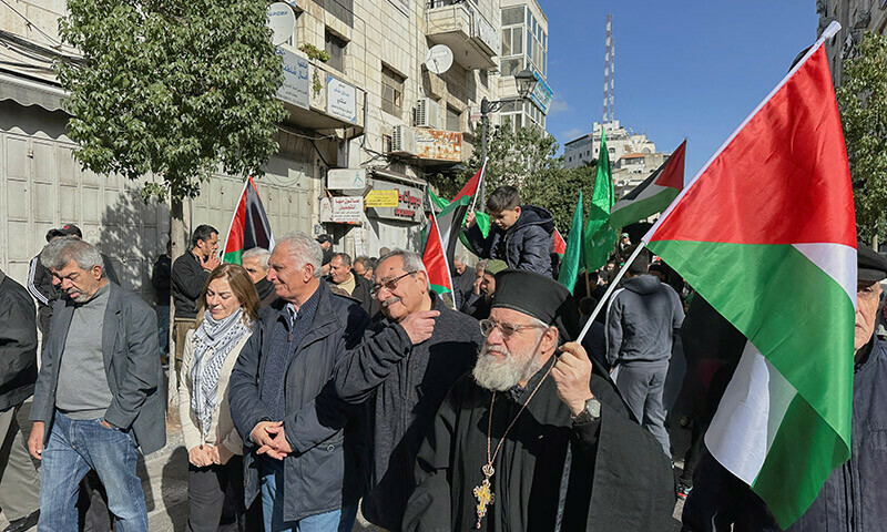 People march as they take part in a protest in support of Palestinians in Gaza, in Ramallah, in the Israeli-occupied West Bank, December 22, 2023. &mdash; Reuters